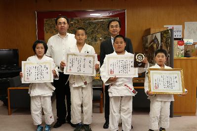 出場報告の写真